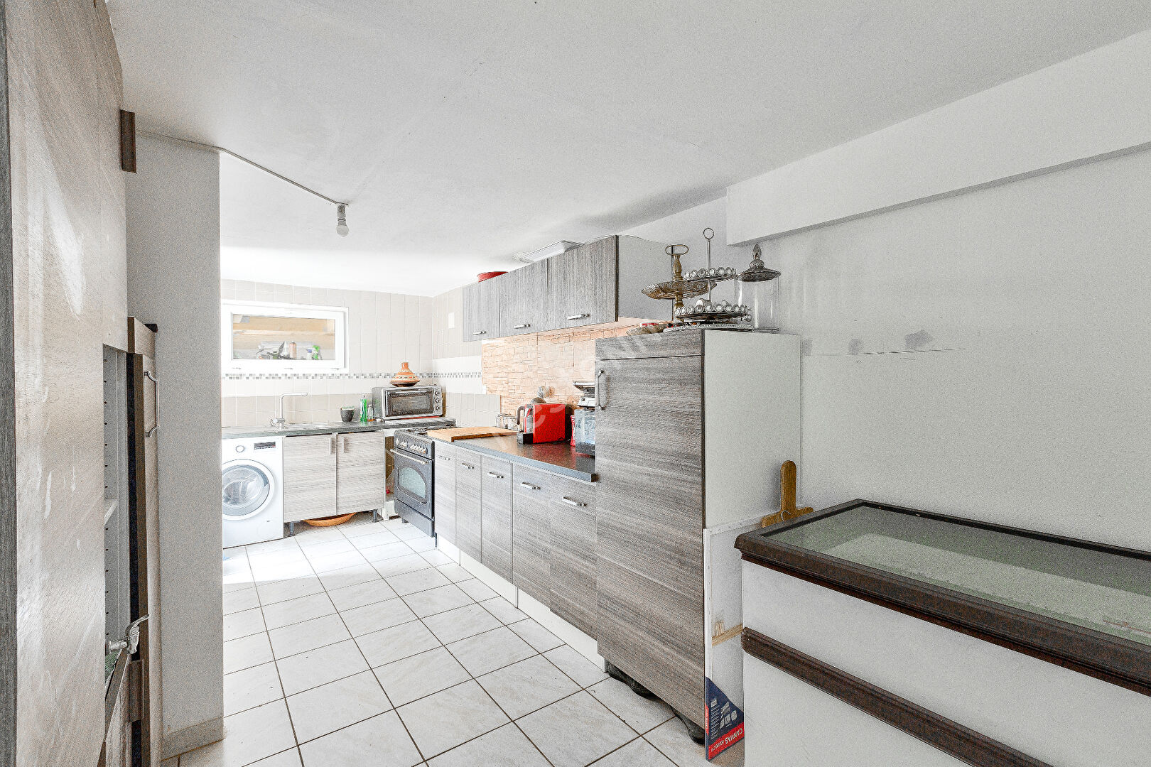 MAISON CONTEMPORAINE HABITABLE DE PLAIN PIED PROCHE CENTRE