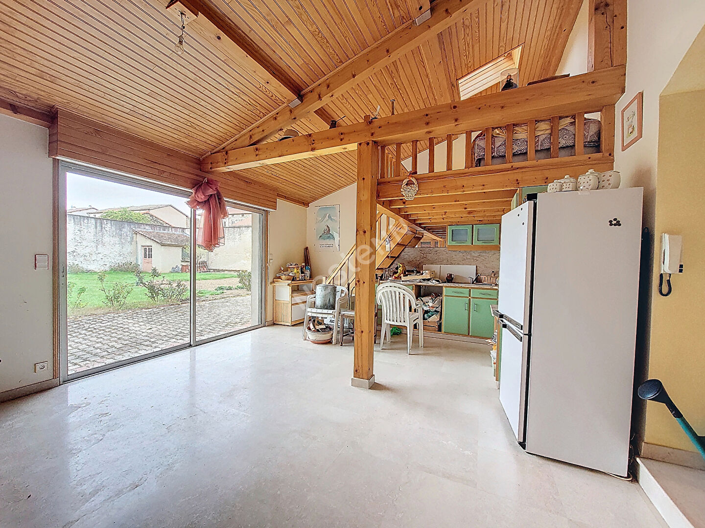 Maison composée de 2 appartements avec terrain dans le centre de Saint Maurice de Lignon