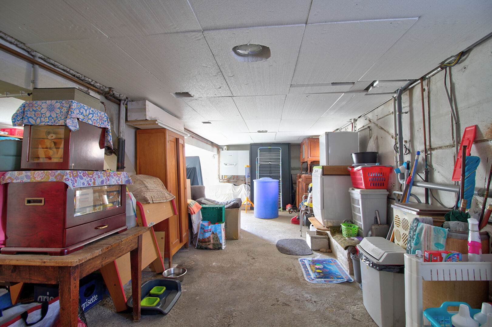 LE PASSAGE - Maison individuelle de 85m² avec 2 chambres, abri voiture, sous-sol et jardin.