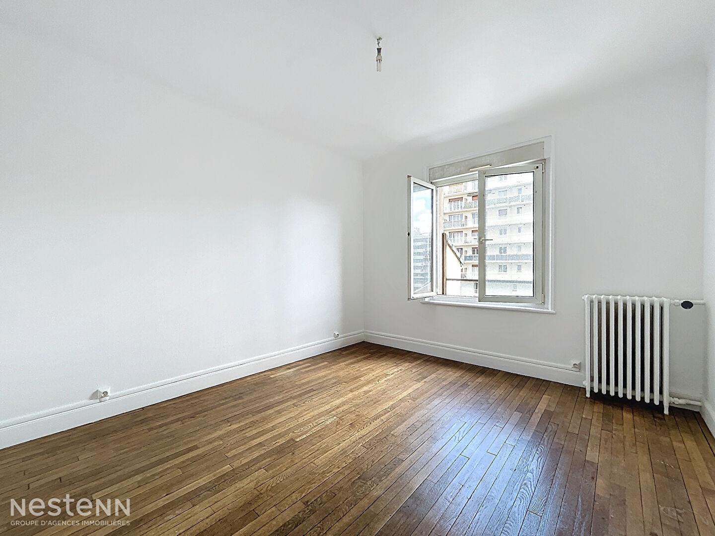 Appartement 3 pièces 58 m² avec balcon, 2 chambres et cuisine équipée