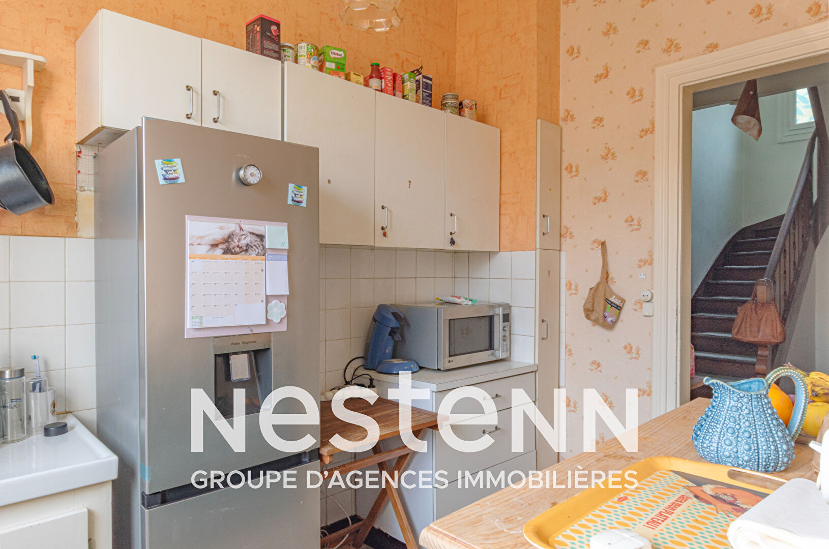 A Blaye-les-Mines, maison  mitoyenne d'un côté 4 pièces principales sur sous-sol complet  avec terrain attenant