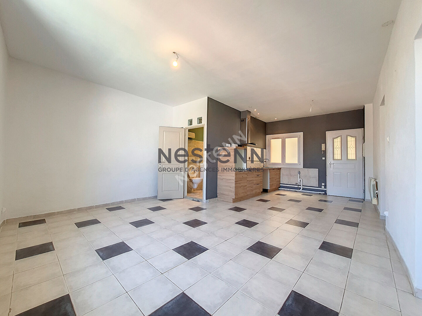 Appartement de 3 pièces 70m² en plein centre de Lunel, proche des arènes