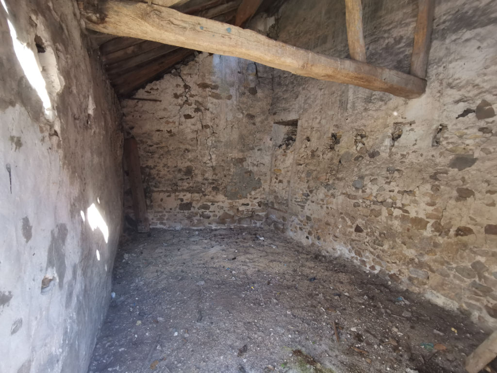 Maison de ville à fort potentiels à remettre en état