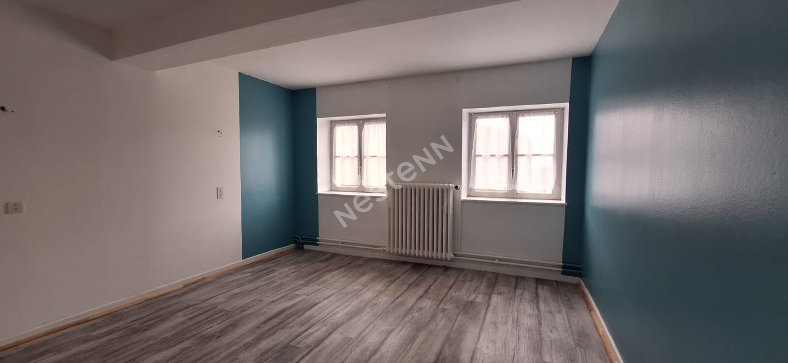 Appartement offrant 5 chambres au bourg d'un village avec toutes commodités