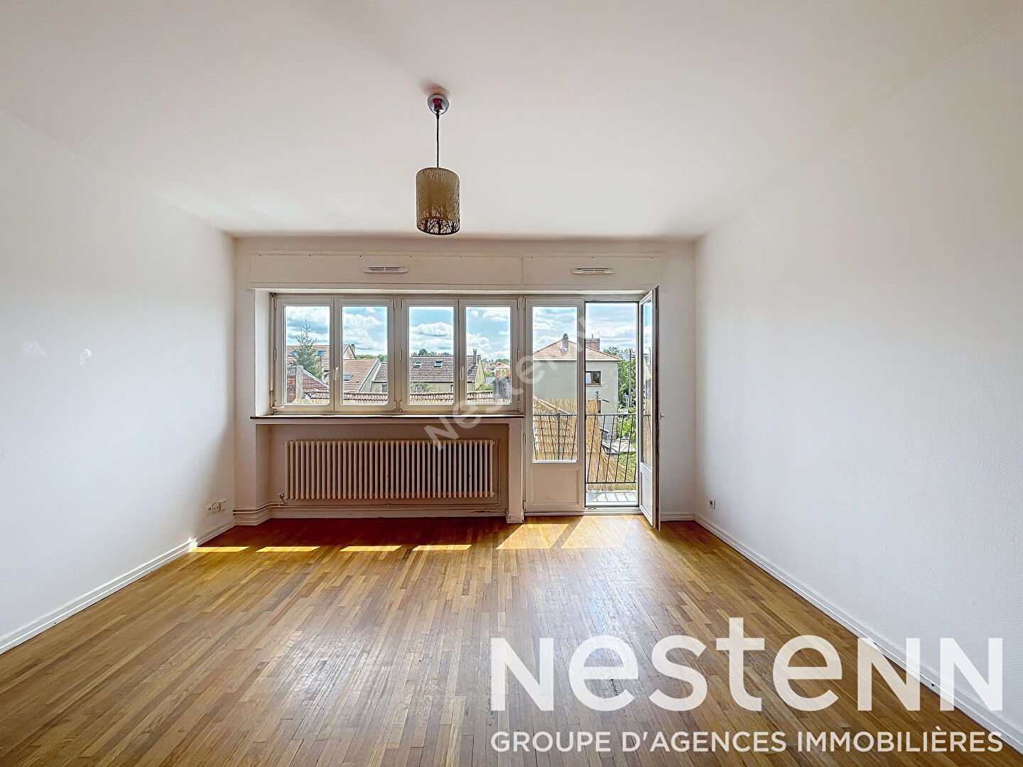 Appartement Metz 74 m2 - traversant - 2 chambres - balcon - parking - cave