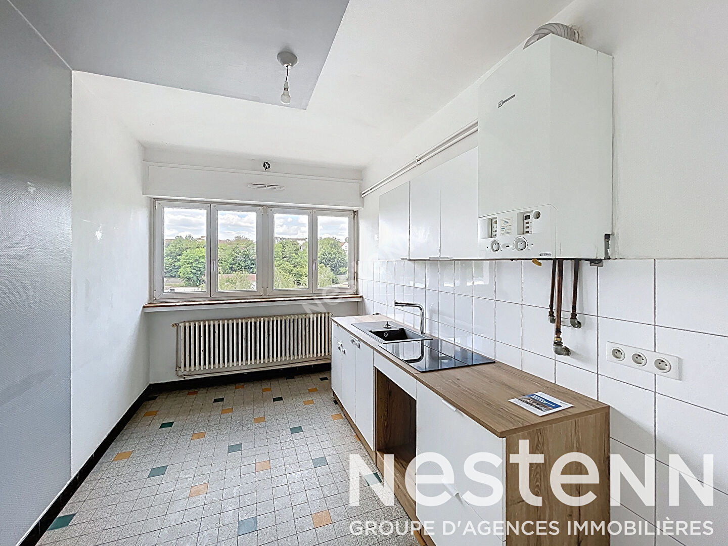 Appartement Metz 74 m2 - traversant - 2 chambres - balcon - parking - cave