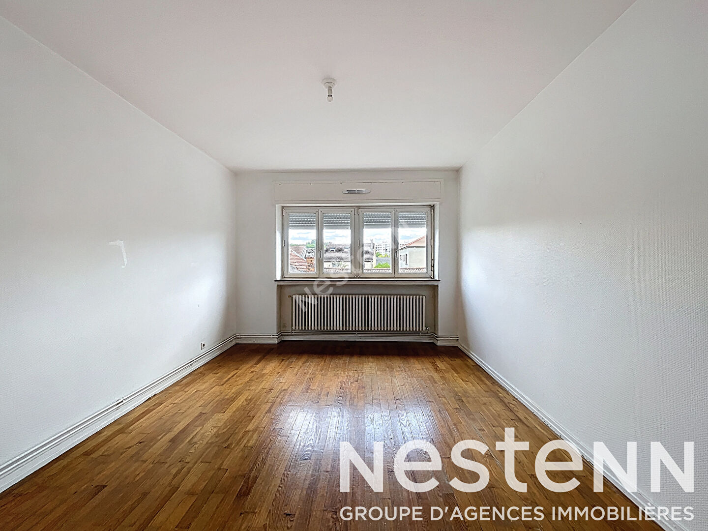 Appartement Metz 74 m2 - traversant - 2 chambres - balcon - parking - cave