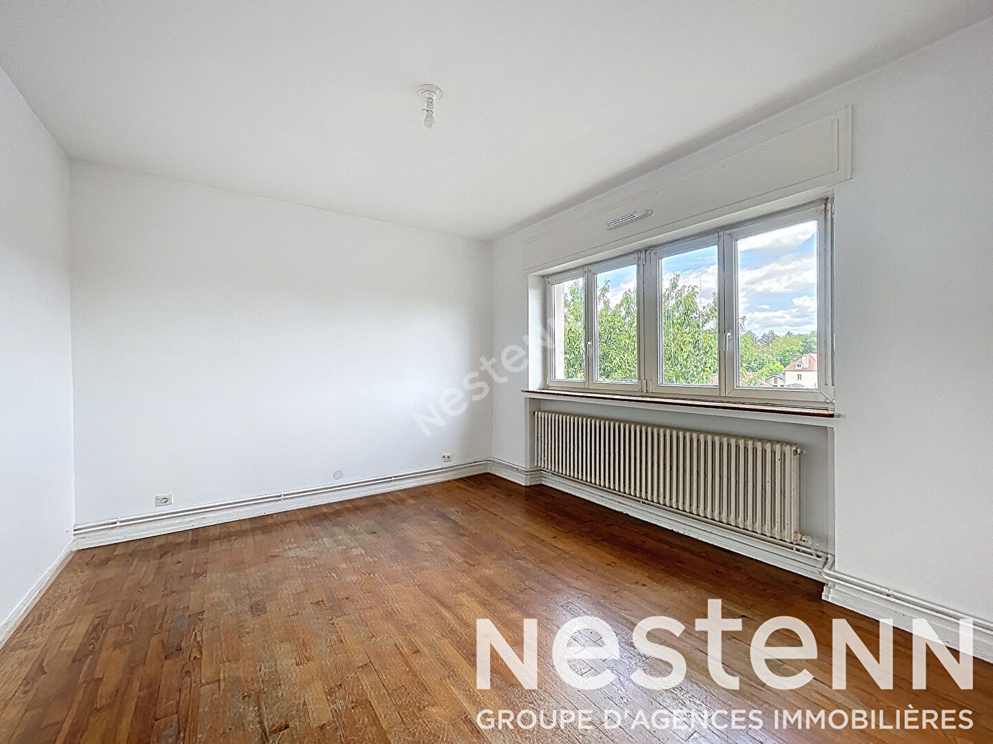 Appartement Metz 74 m2 - traversant - 2 chambres - balcon - parking - cave